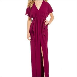 H by Halston Long v neck gown with slit. flutter sleeves